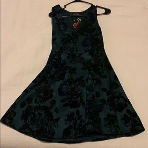 Deep Green dress with black velvet roses